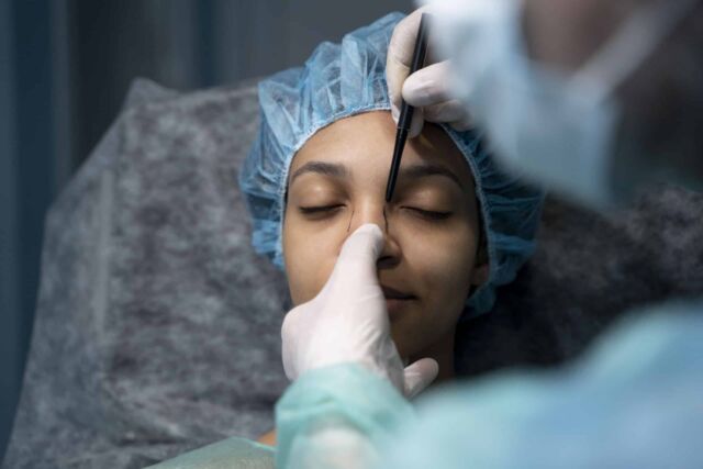 A mexican women having a nose job